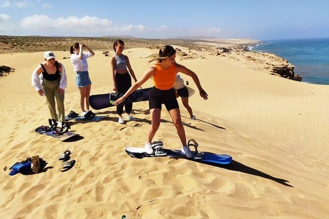 Sandboarding in the dunes